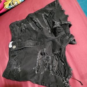 Black ripped shorts